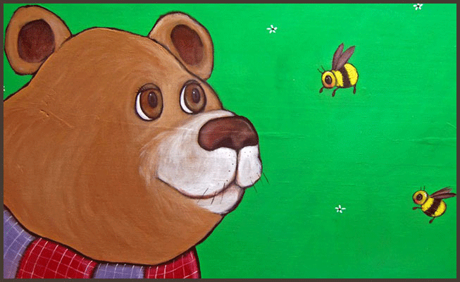 Painting by Lizzie of a bear and bees.